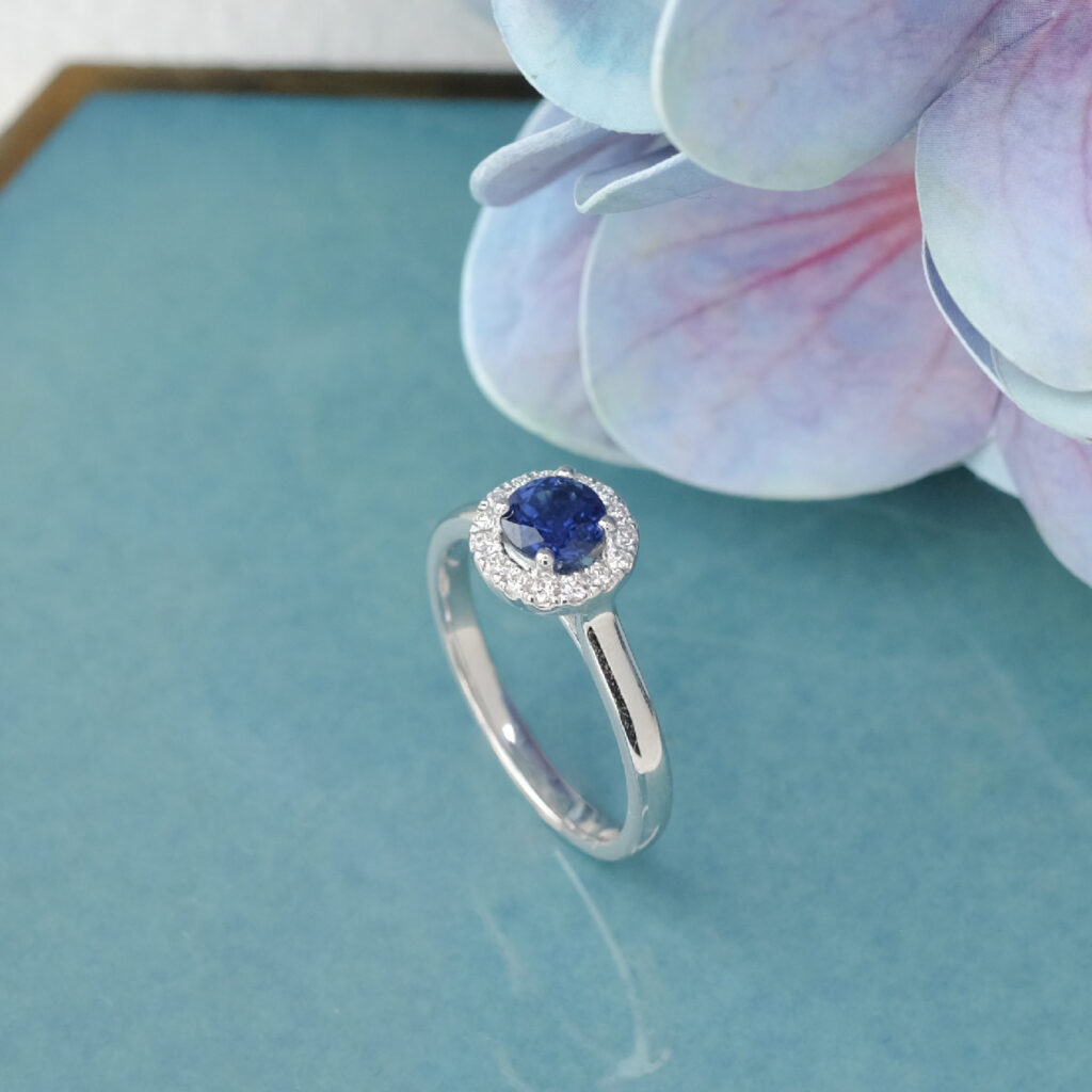 Round Blue Sapphire Halo diamond solitaire engagement ring