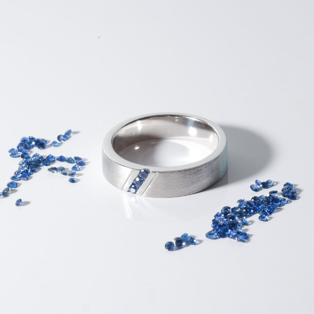 three stone blue sapphire matte wedding band