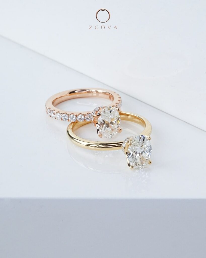 Oval diamond engagement ring yellow gold and rose gold