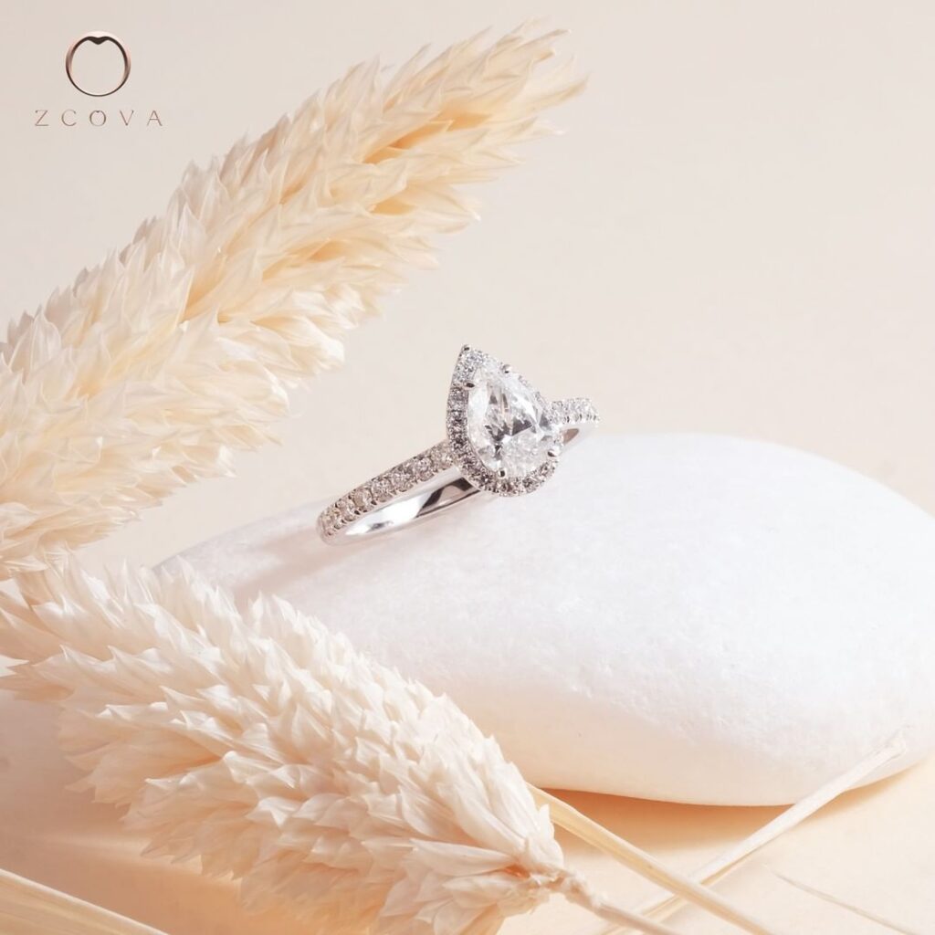 Pear shape diamond Halo Engagement Ring