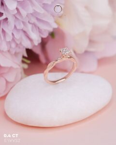 Princess cut tulip twisted band engagement ring