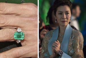 michelle yeoh emerald gemstone with side pear diamond engagement ring
