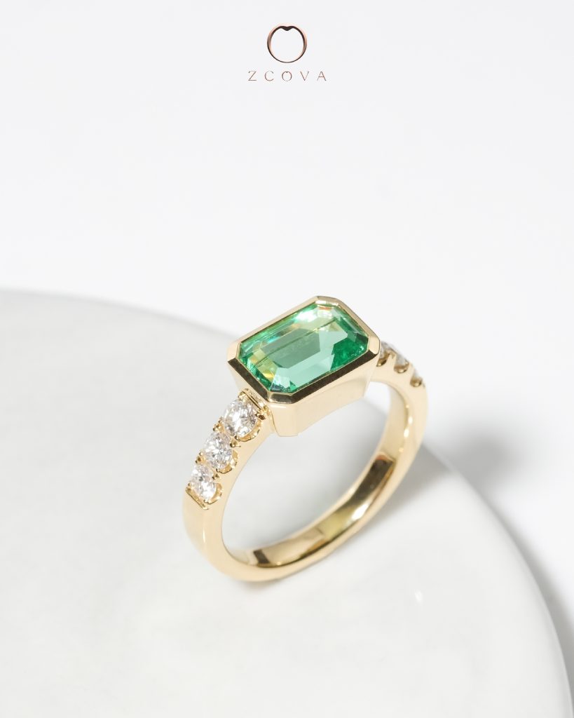 Octagon Green Emerald Gemstone Bezel Setting with 6 Side Diamonds Yellow Gold