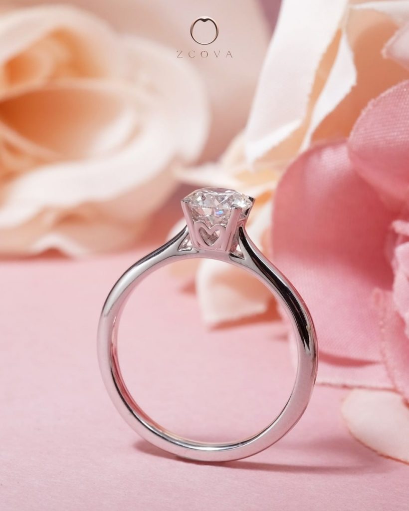Customised Engagement ring with side heart shape