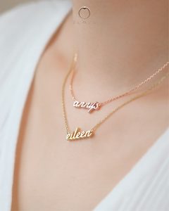 Name necklace in 18K yellow gold and rose gold