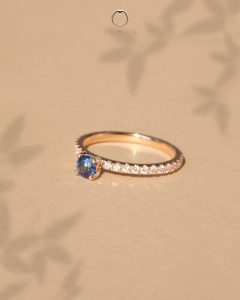 Cornflower blue sapphire with pave diamond engagement ring in 18K rose gold